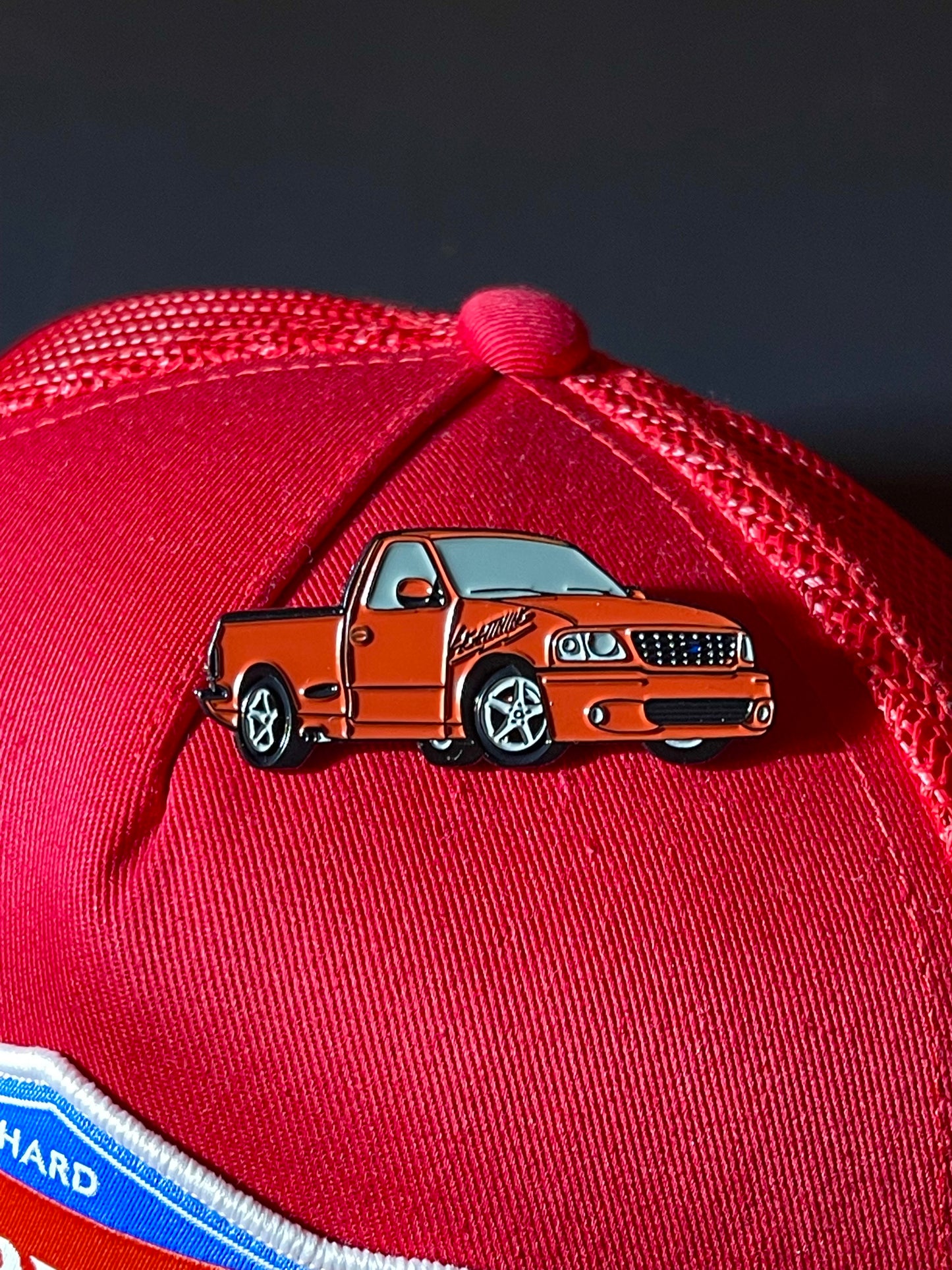 RED LIGHTNING TRUCK PIN